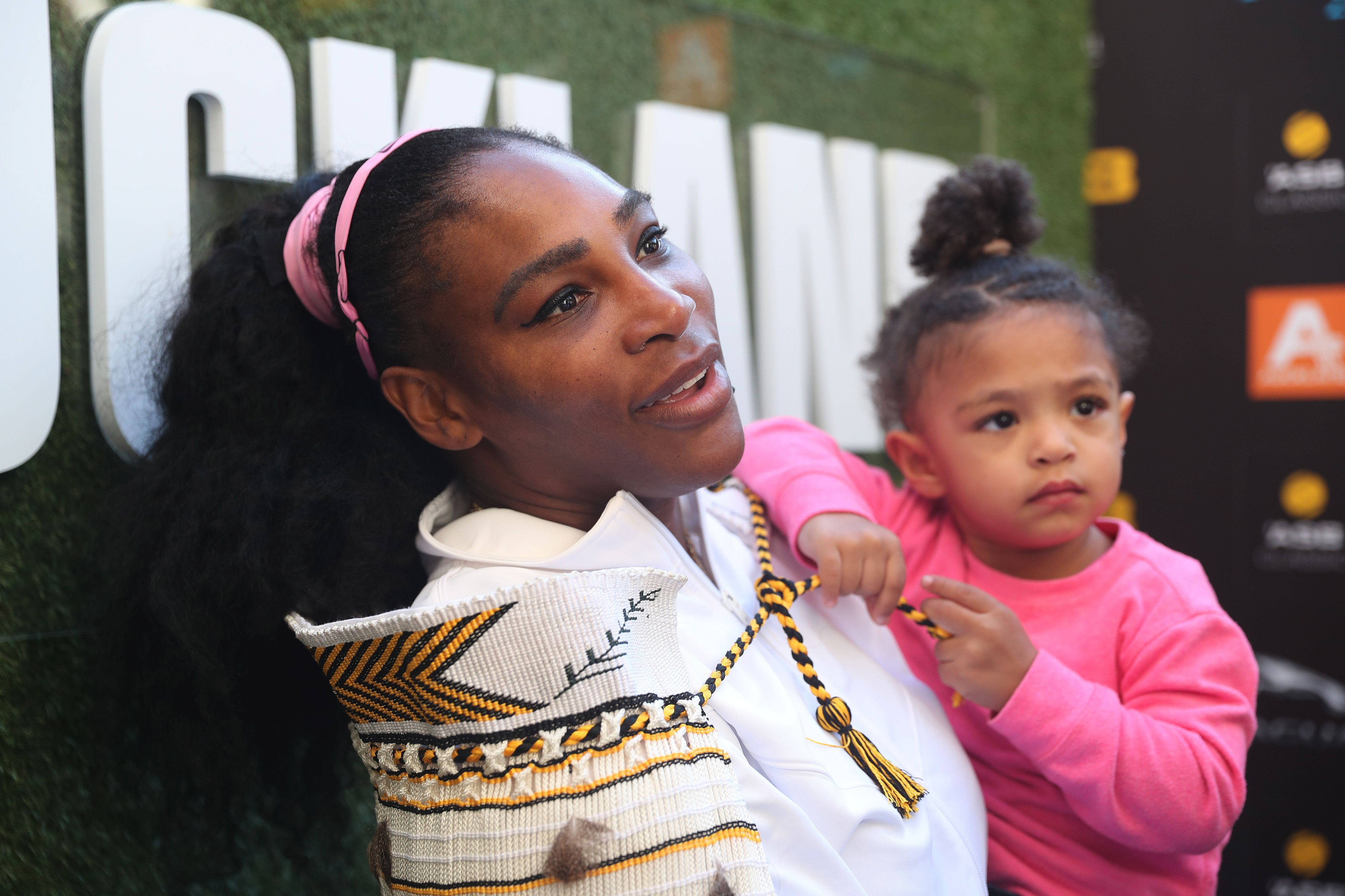 Serena Williams and her first daughter, Olympia. [MICHAEL BRADLEY/AFP via Getty Images]
