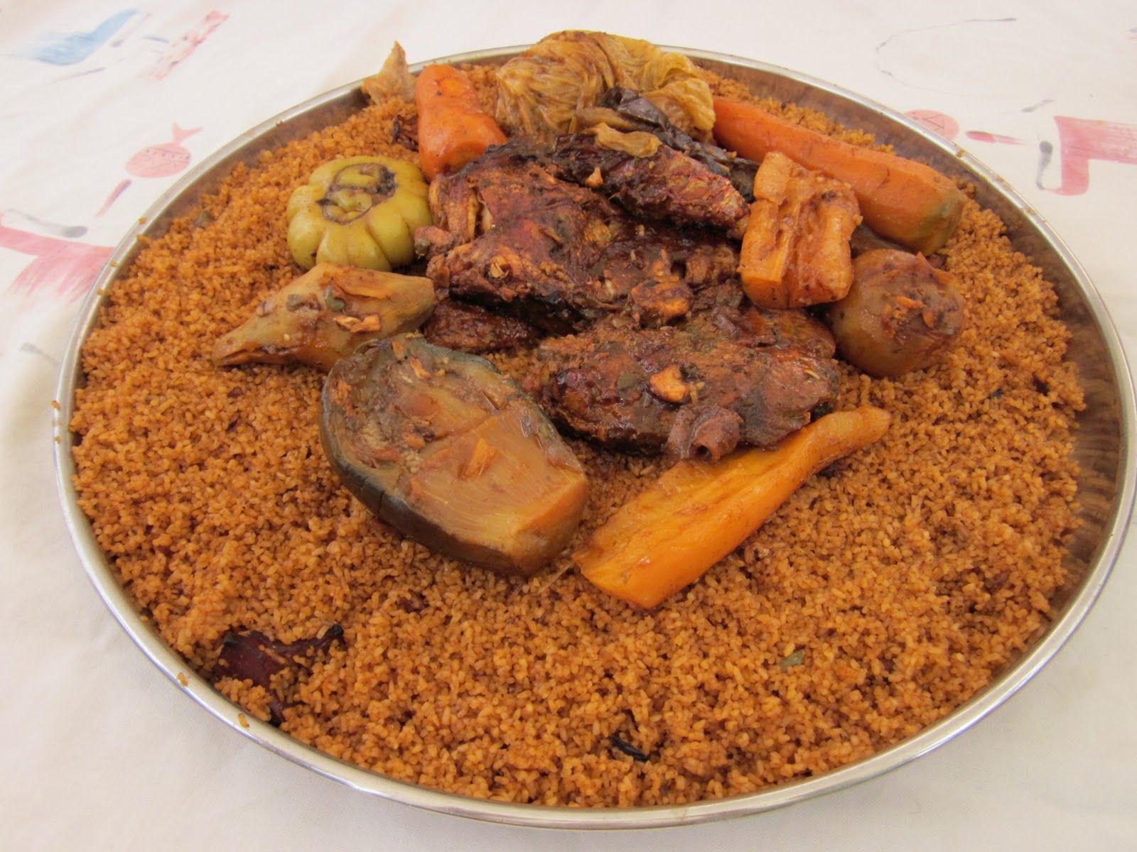 Jollof rice (called Ceebu jën in Senegal according to the Wolof spelling)