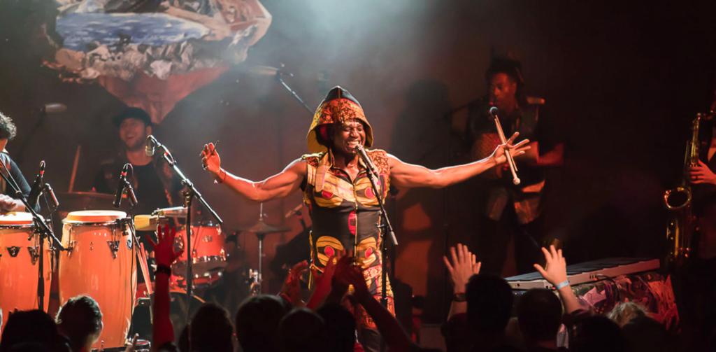 Amayo performing on stage