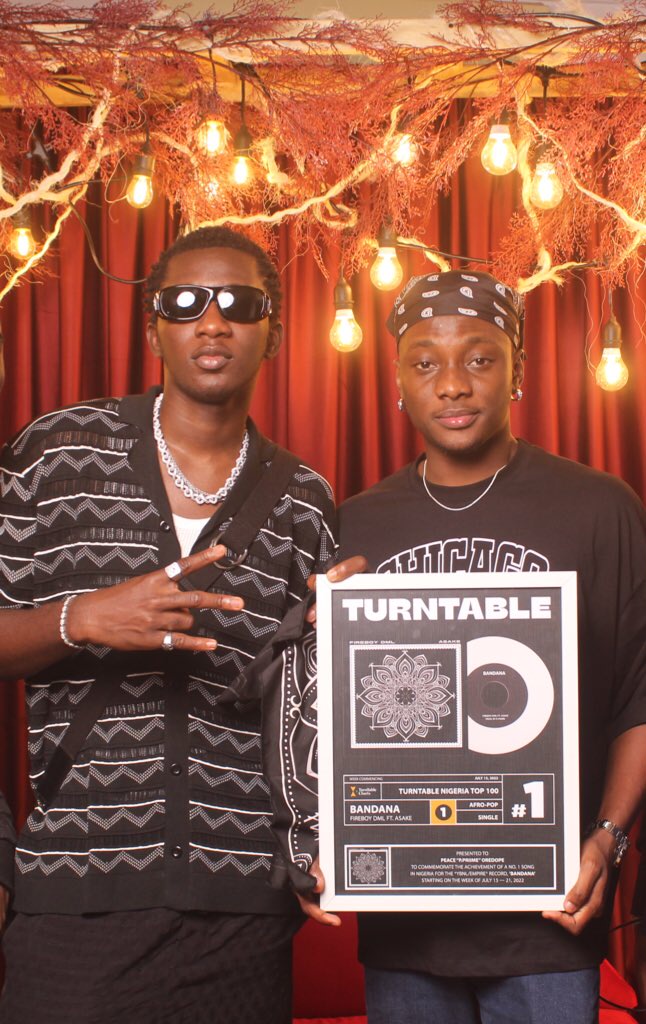 P.Priime receives his plaque for producing 'Bandana'