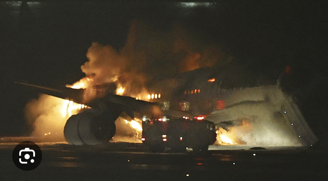 Plane catches fire after landing on runway at Tokyo airport