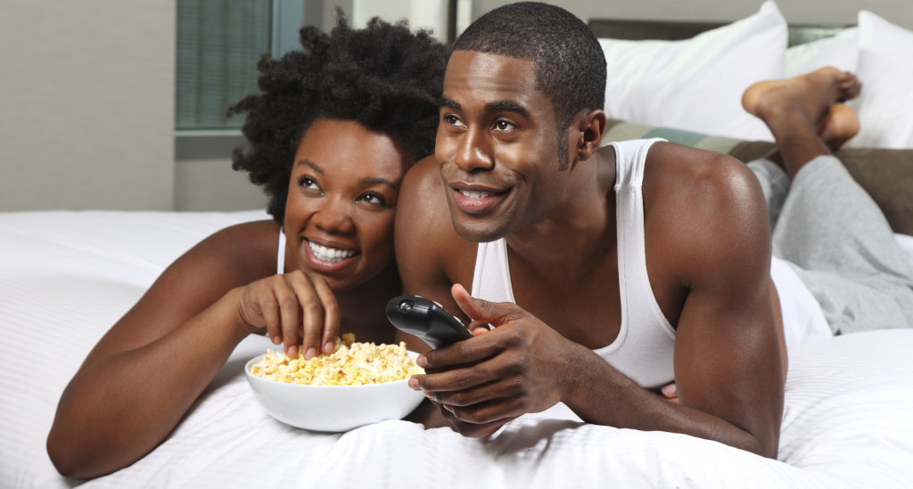 Black couple watching a movie