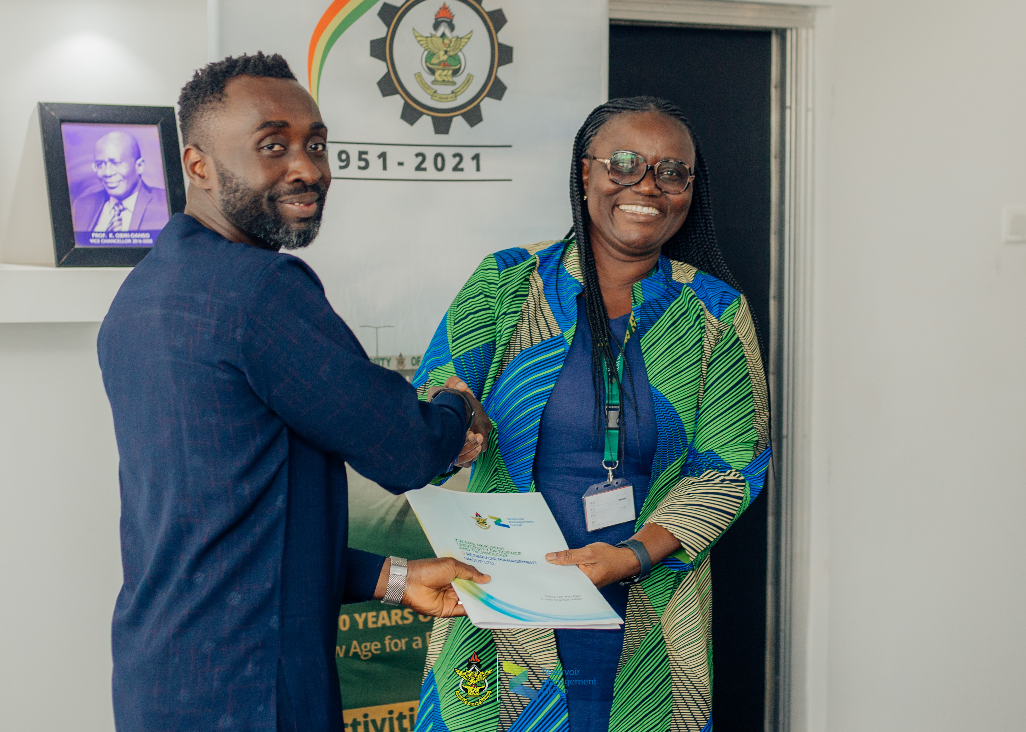 Nana Akwasi Ankamah - Managing Director (RMG), left, shaking hands with Prof Rita Akosua Dickson Vice Chancellor (KNUST), right