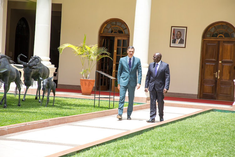 William Ruto and Pedro Sanchez outside the state house