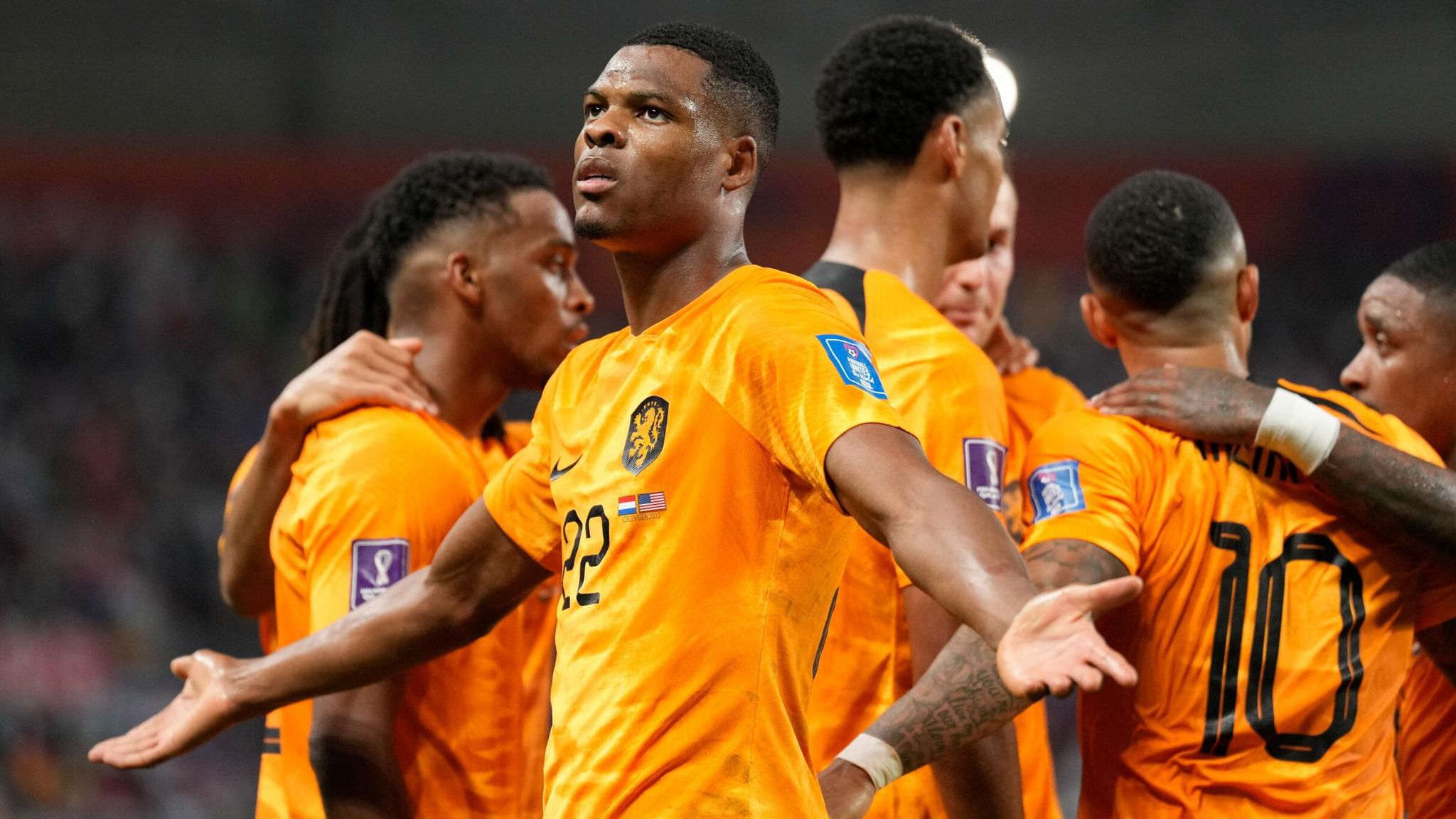 Dutch wing-back Denzel Dumfries celebrates after scoring the Netherlands third goal against USA