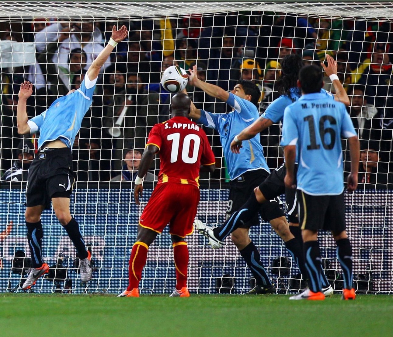 Luis Suarez stops Ghana from scoring at the 2010 FIFA World Cup. 