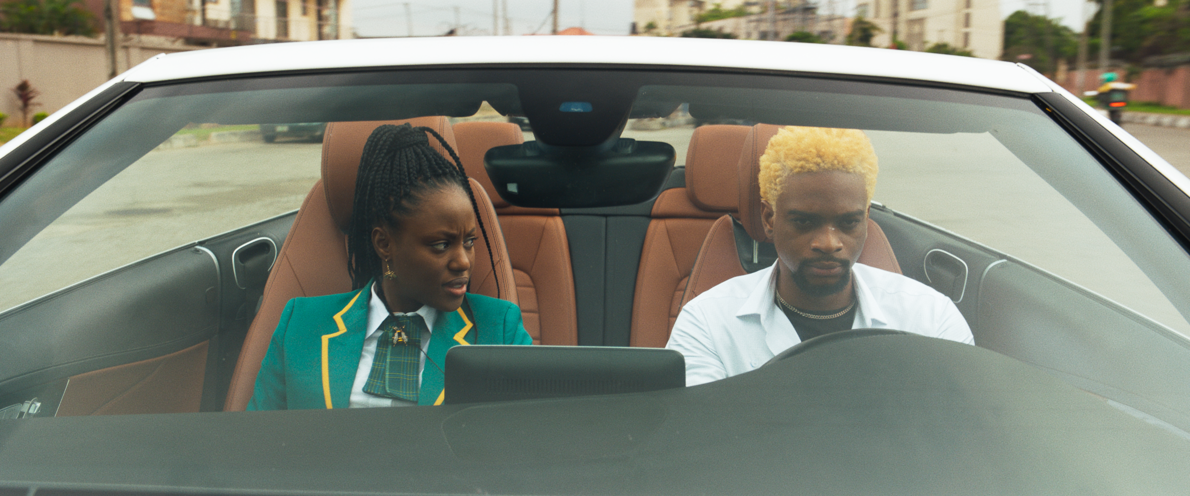 (L-R) Elma Mbadiwe and Olumide Oworu star as Carmen and Atlas respectively in 'Far From Home' (Credit: Nora Awolowo / Netflix)