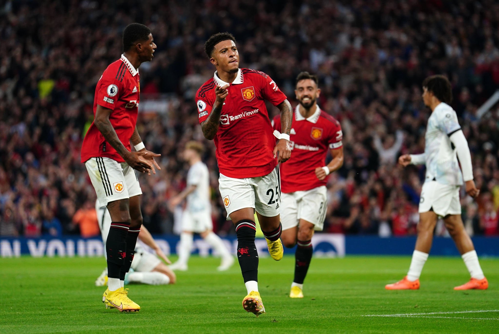 Jason Sancho opened the scoring as Manchester United defeated Liverpool 2-1