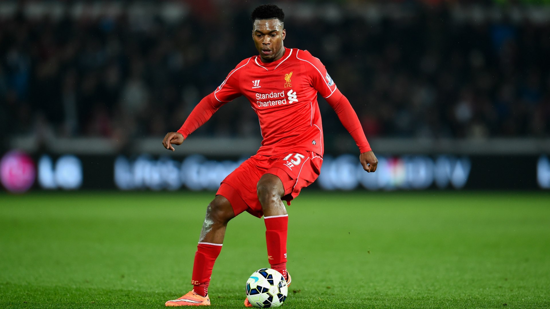 Daniel Sturridge congratulates Michael Essien for acquiring UEFA A coaching license