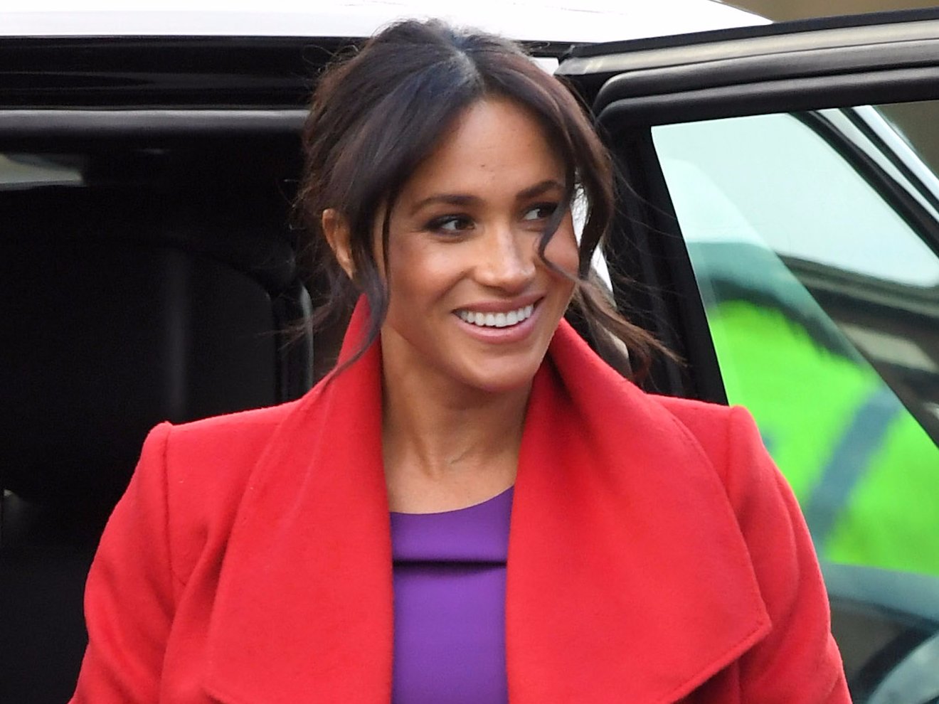 Meghan Markle turned heads in a bright red coat and purple dress that channeled the Queen and Princess Diana Pulse Nigeria