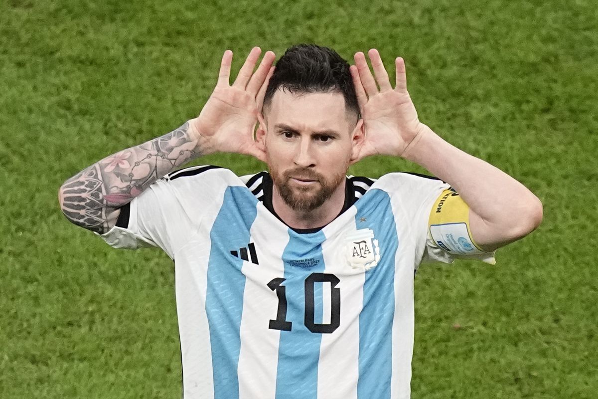 Lionel Messi celebrating after scoring for Argentina against Netherlands in the World Cup quarter-final