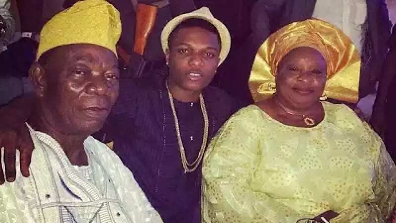 Wizkid and his parents.