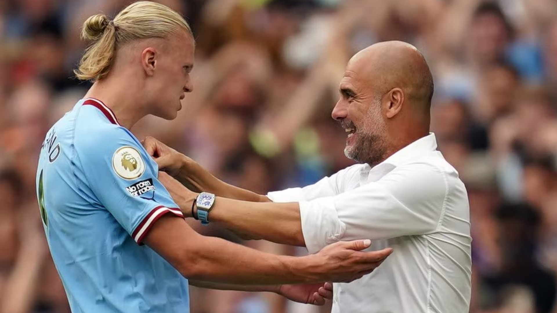 Pep Guardiola and Erling Haaland