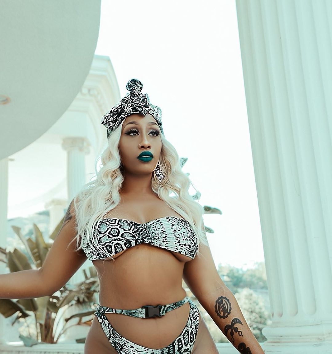 Victoria Kimani's boobs threaten to spill out of revealing shell