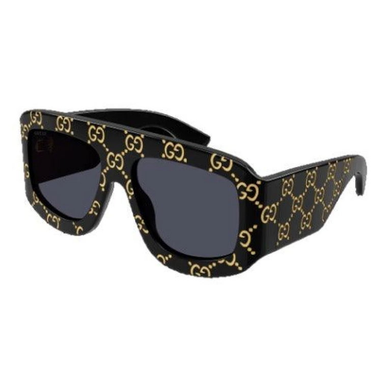 Nowy model okularów przeciwsłonecznych z dekoracyjnymi złotymi akcentami Gucci