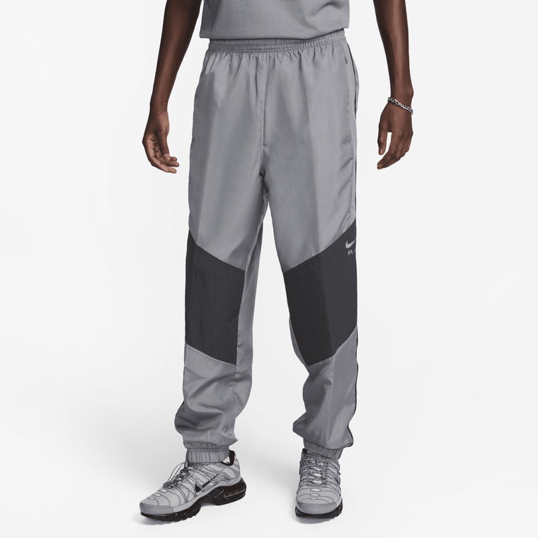 Męskie spodnie z tkaniny Nike Air - Szary