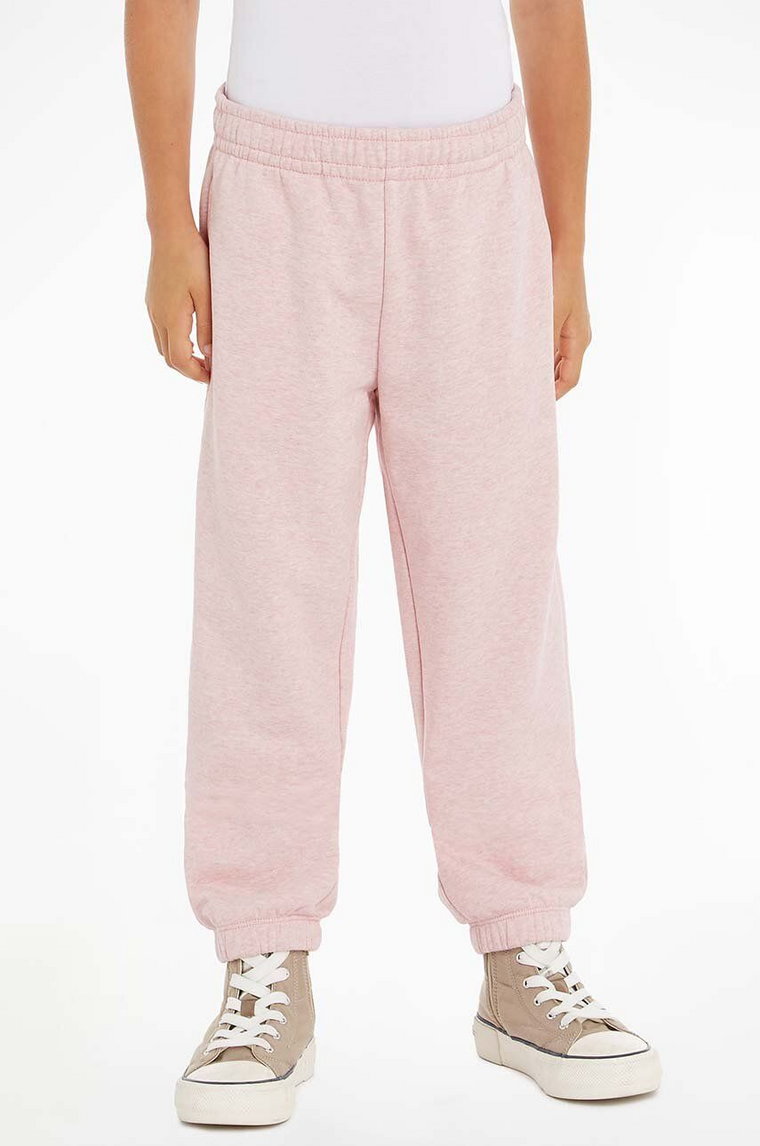 Tommy Hilfiger spodnie dresowe bawełniane dziecięce kolor różowy gładkie