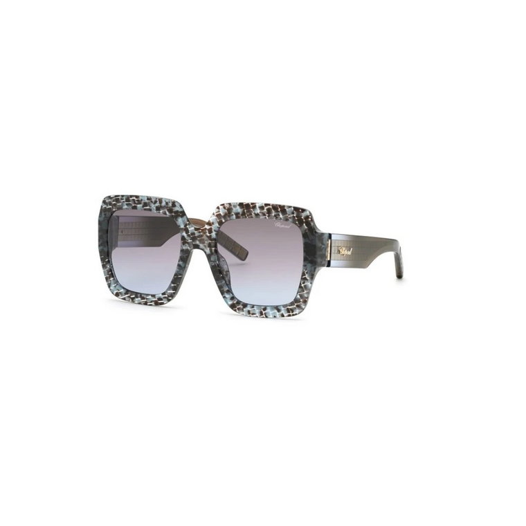 Stylowe okulary przeciwsłoneczne z niebieskimi szkłami gradientowymi Chopard