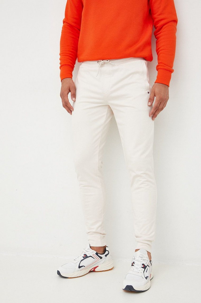 Tommy Hilfiger spodnie dresowe męskie kolor beżowy gładkie