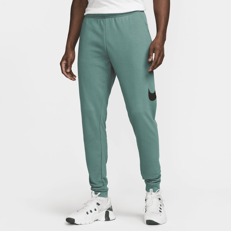 Męskie zwężane spodnie do fitnessu Dri-FIT Nike Dry Graphic - Zieleń