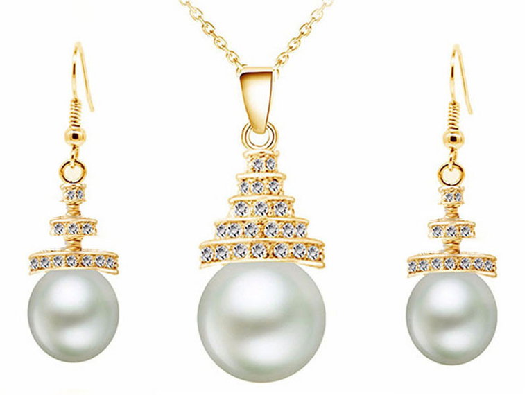 Komplet eleganckiej biżuterii wiszące białe perły wyjątkowy wzór trójkąciki