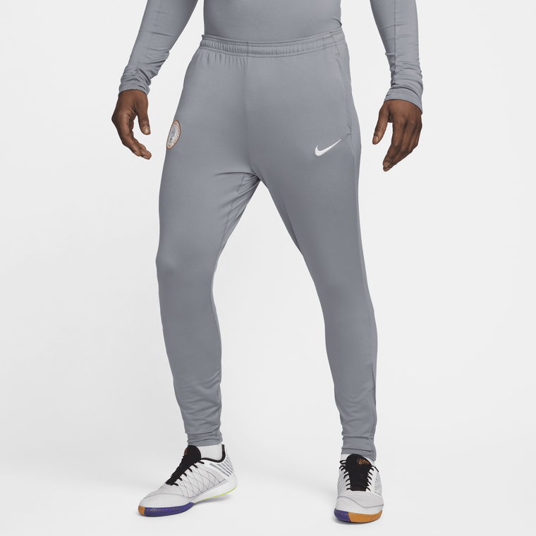 Męskie spodnie piłkarskie z dzianiny Nike Dri-FIT Nigeria Strike - Szary