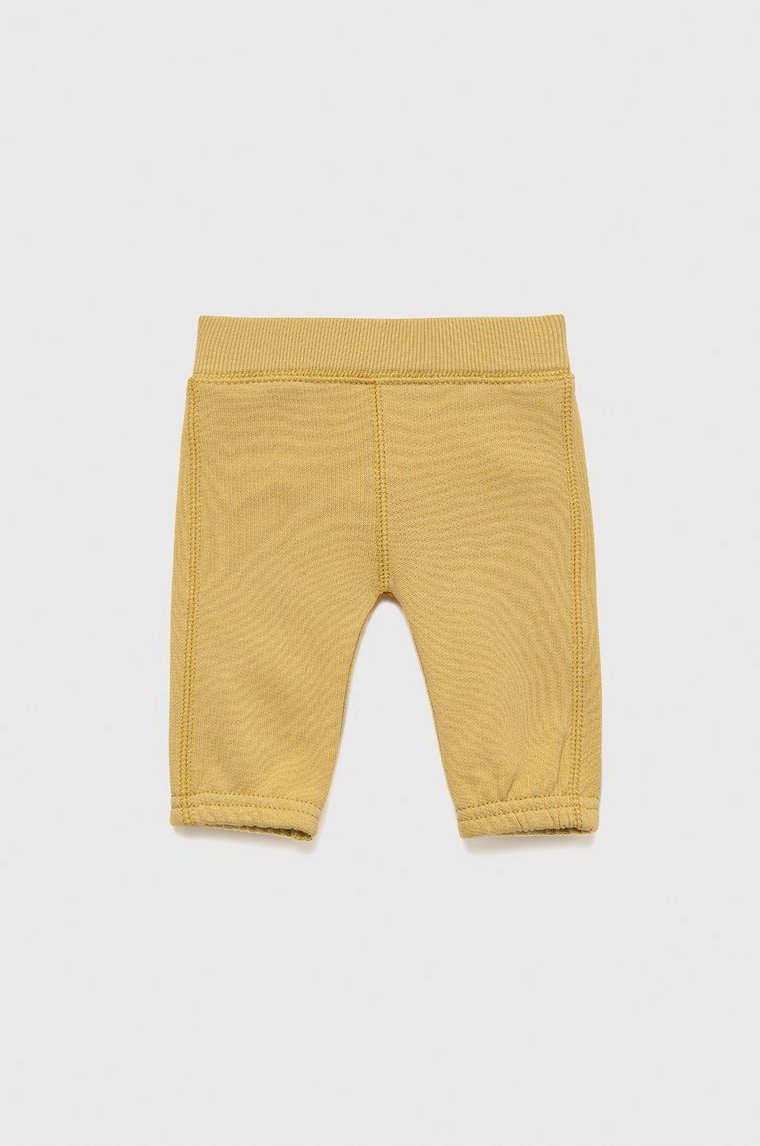 United Colors of Benetton spodnie dresowe bawełniane dziecięce kolor żółty z aplikacją