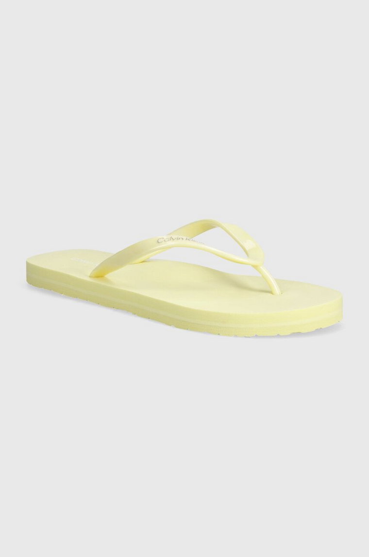 Calvin Klein japonki FLIP FLOP DEBOSS LOGO MET damskie kolor żółty na płaskim obcasie HW0HW02043