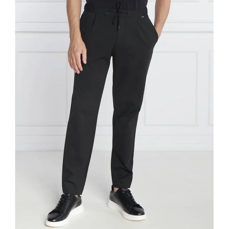 Calvin Klein Spodnie dresowe COMFORT KNIT PLEAT | Tapered fit