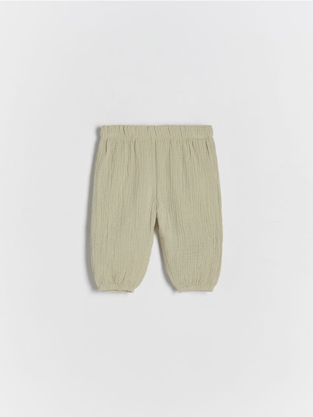 Reserved - Spodnie z bawełnianego muślinu - jasnozielony