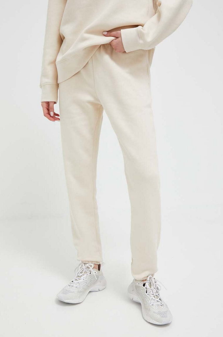 Casall spodnie dresowe kolor beżowy gładkie