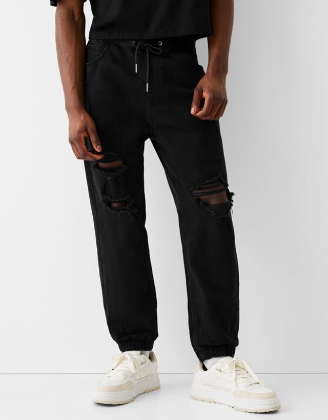 Bershka Jeansy Jogger Z Przetarciami Mężczyzna M Czarny