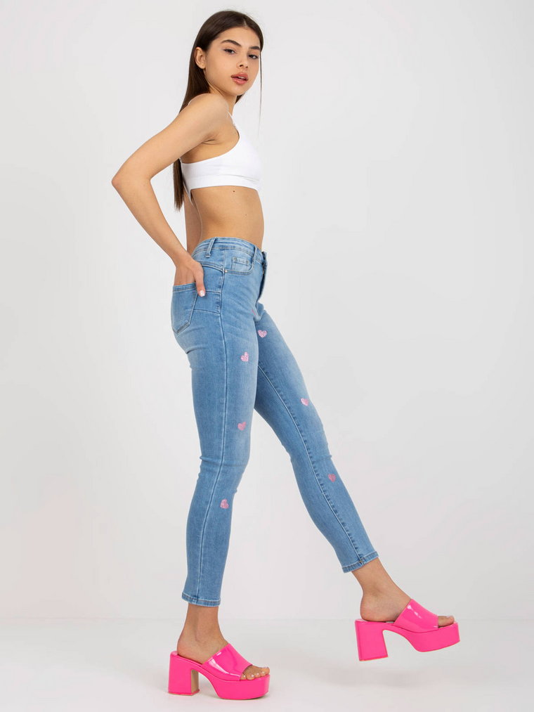 Spodnie jeans jeansowe niebieski casual rurki nogawka zwężana suwak guziki