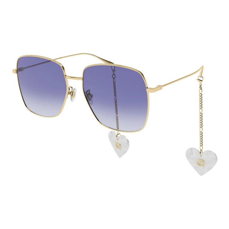 Stylowe okulary przeciwsłoneczne z ramką w kolorze złota i fioletowymi soczewkami gradientowymi Gucci