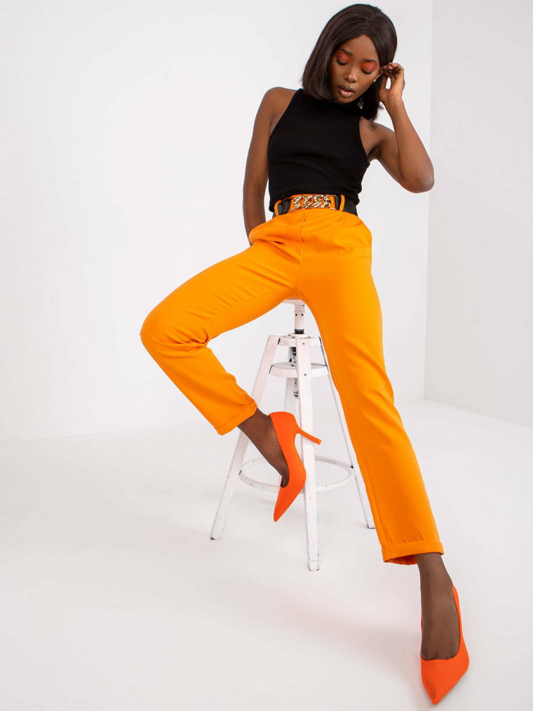 Spodnie z materiału jasny pomarańczowy klasyczny elegancki chinosy nogawka prosta