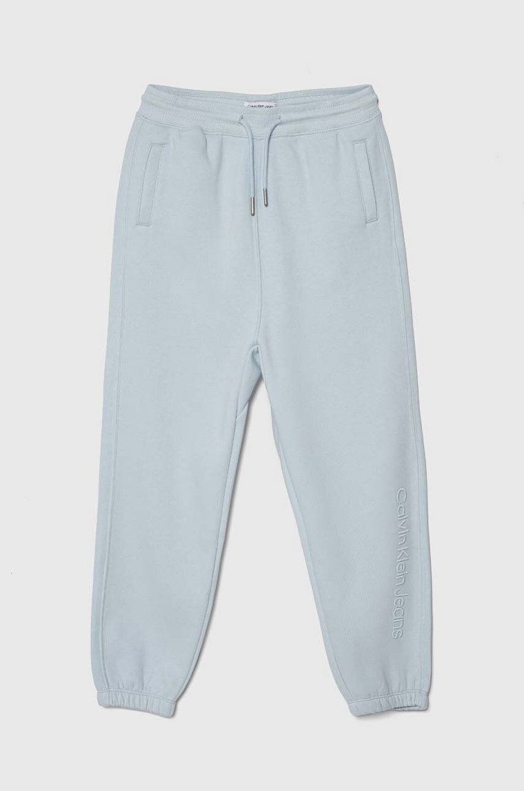 Calvin Klein Jeans spodnie dresowe dziecięce kolor niebieski z aplikacją