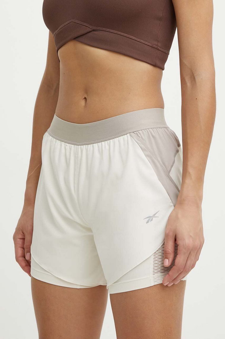 Reebok szorty do biegania kolor beżowy wzorzyste high waist 100076065