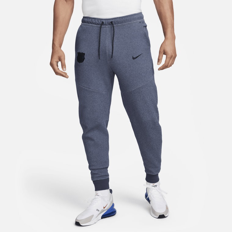 Męskie joggery piłkarskie Nike FC Barcelona Tech Fleece (wersja trzecia) - Niebieski