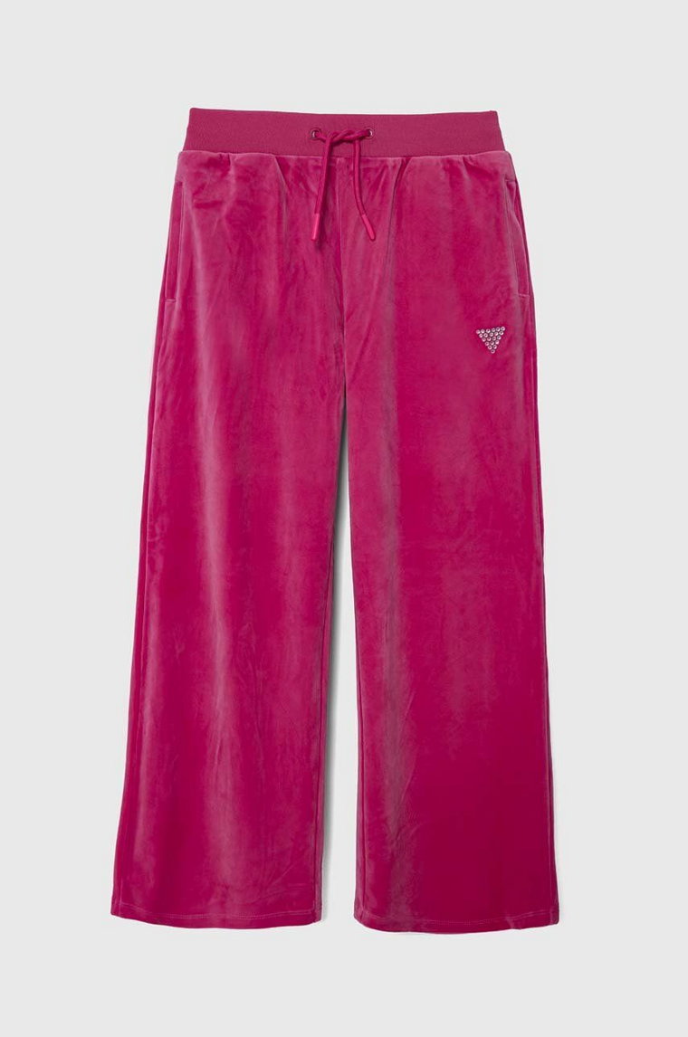 Guess spodnie dresowe welurowe dziecięce kolor różowy gładkie