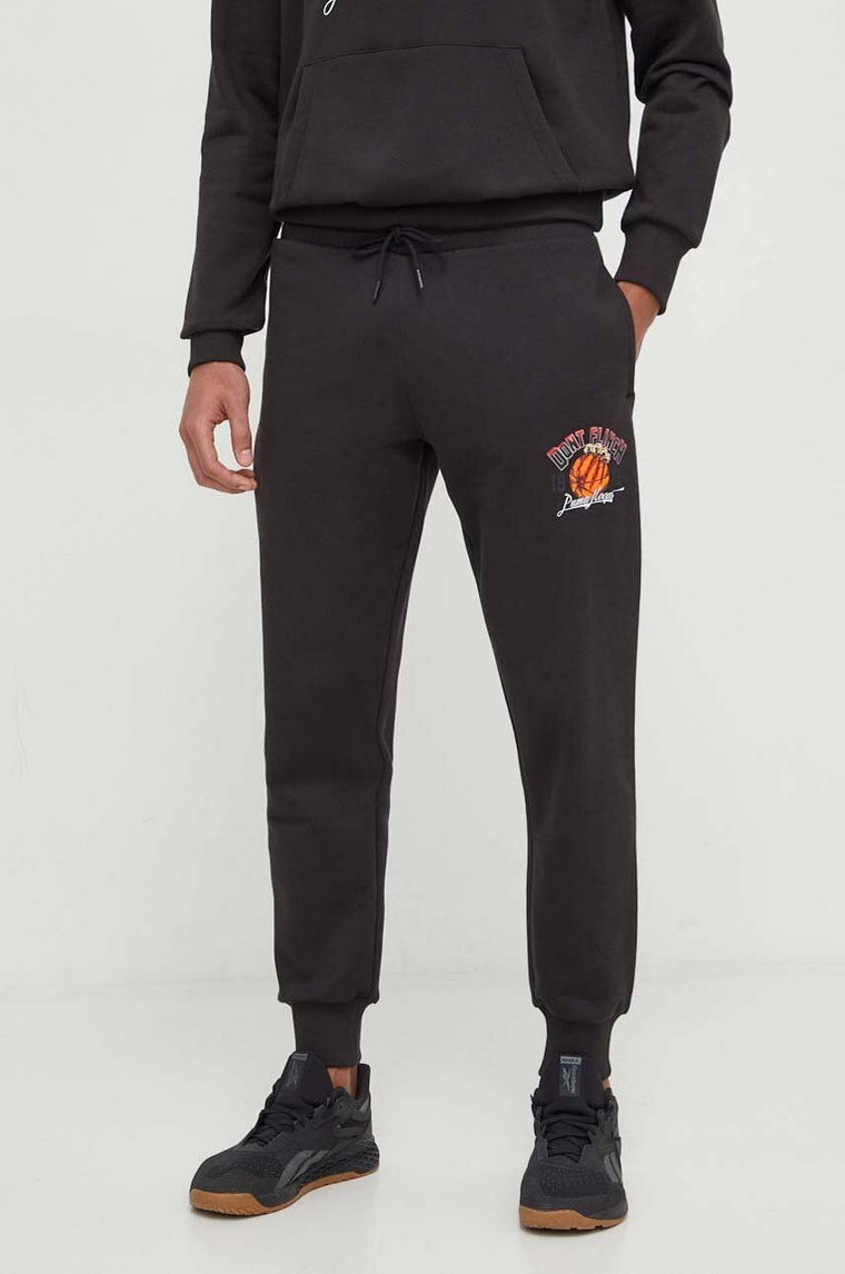Puma spodnie dresowe kolor czarny z nadrukiem 624813
