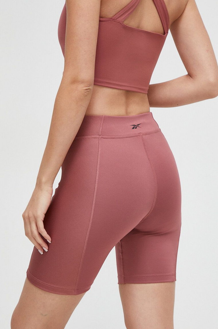 Reebok szorty do jogi kolor różowy gładkie high waist