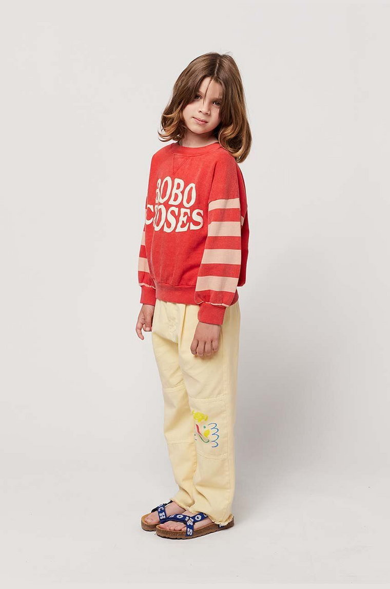 Bobo Choses spodnie bawełniane dziecięce kolor żółty z nadrukiem