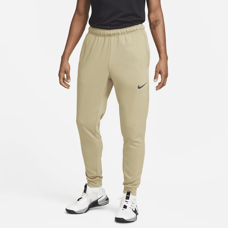 Męskie zwężane spodnie do fitnessu z dzianiny Dri-FIT Nike Dry - Brązowy