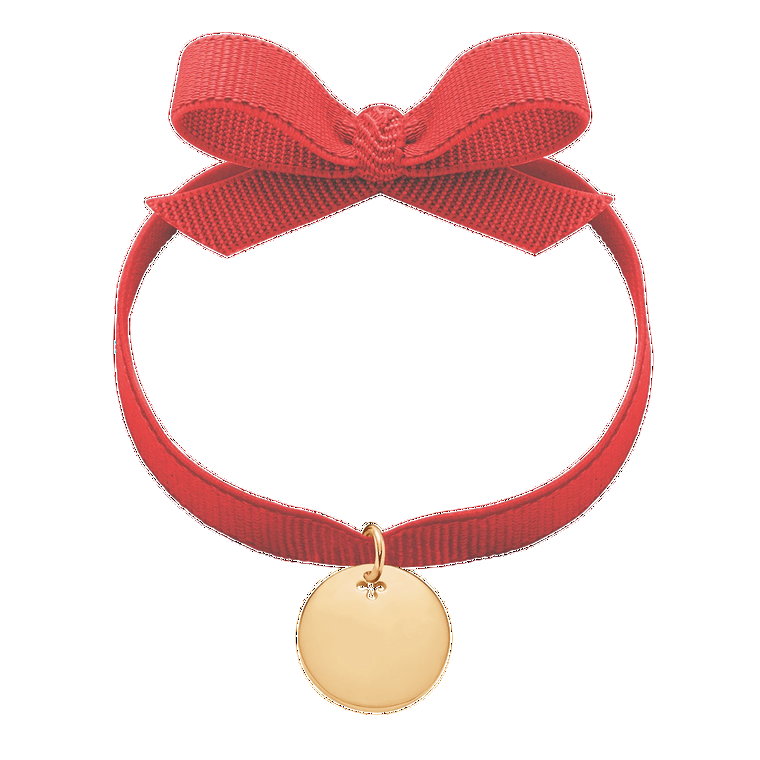 Bransoletka z pozłacanym medalikiem na czerwonej wstążce