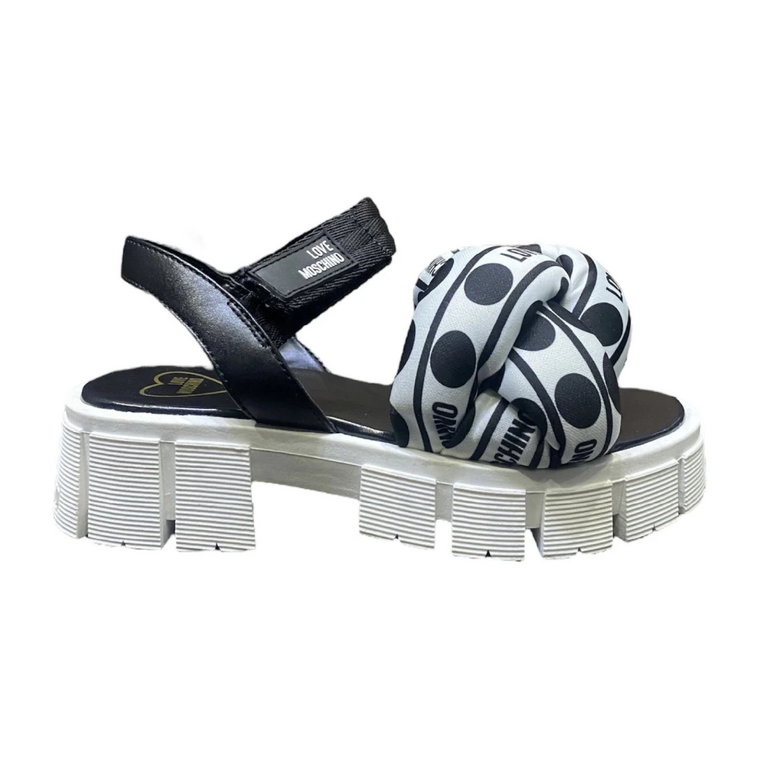 Czarne płaskie sandały z tkaniny o splocie z białym wzorem w kropki i logo Love Moschino