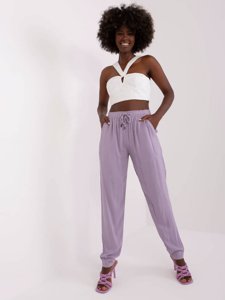 Spodnie z materiału jasny fioletowy casual materiałowe nogawka prosta wiązanie