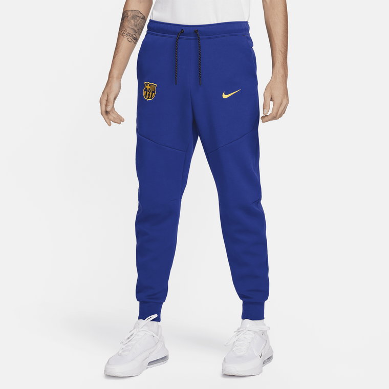 Męskie joggery piłkarskie Nike FC Barcelona Tech Fleece - Niebieski