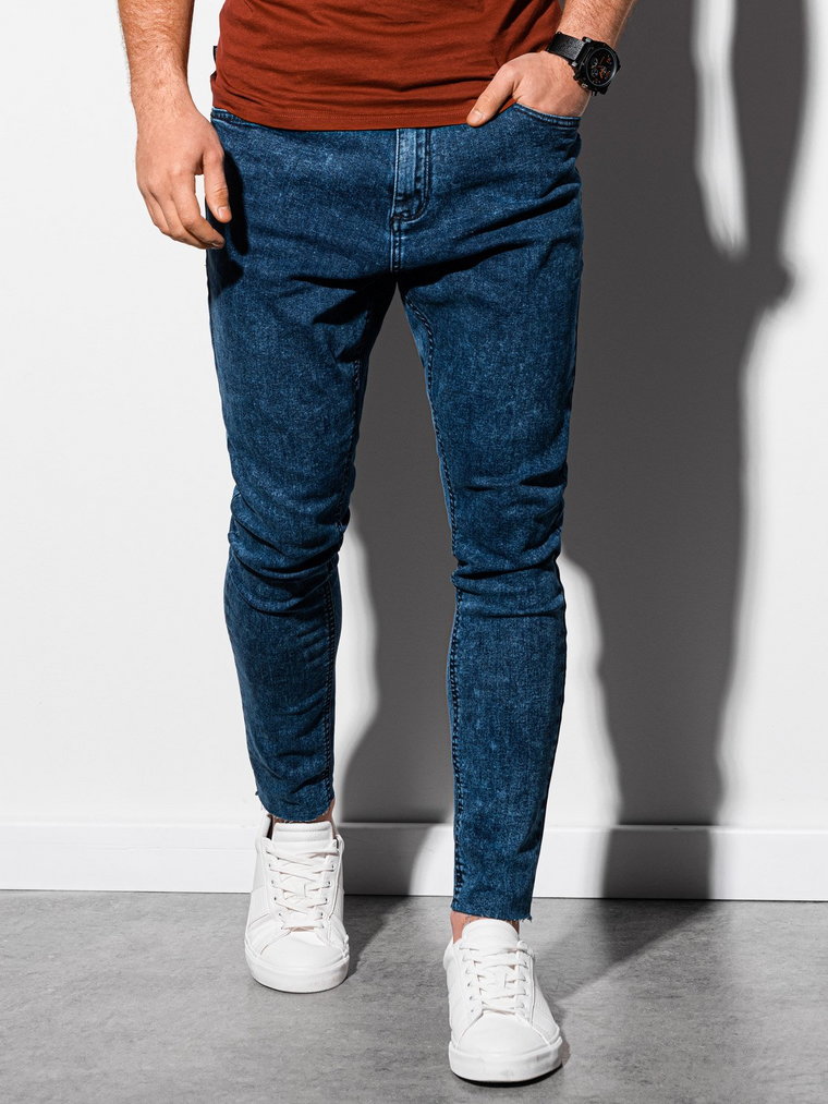 Męskie spodnie jeansowe marmurkowe z surowo wykończoną nogawką SLIM FIT - ciemnoniebieskie V4 OM-PADP-0146