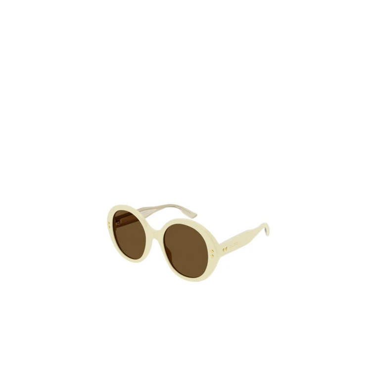 Okrągłe okulary przeciwsłoneczne z żółtą oprawką i brązowymi soczewkami Gucci