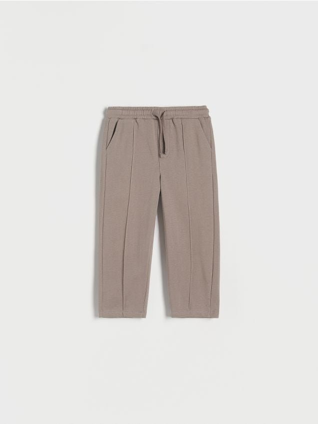 Reserved - Dresowe spodnie z przeszyciami - brązowy